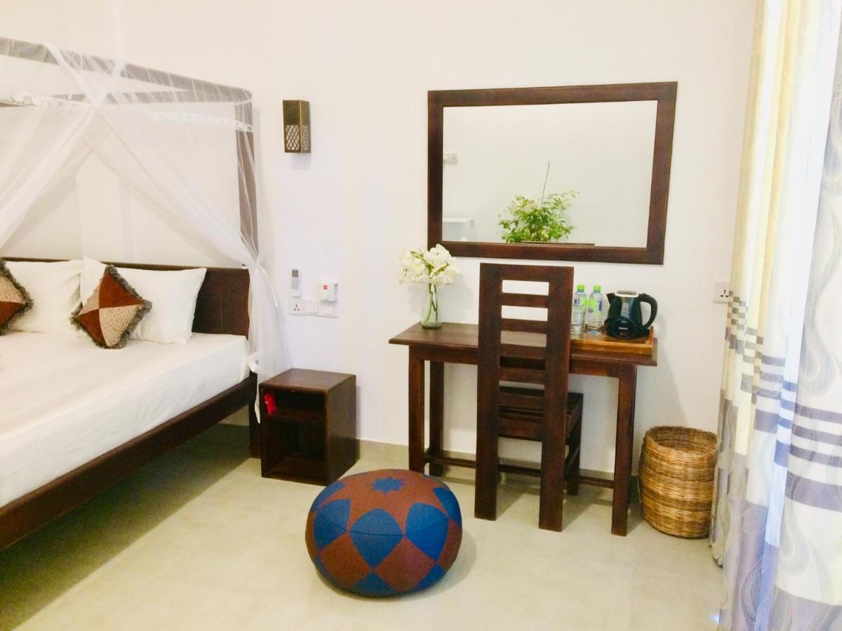Tropicana Home Stay Baía de Arugam Exterior foto